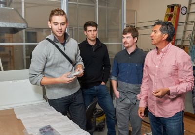 At the MIDAS lab, engineering and business students from the University of British Columbia Okanagan learn and improve the art of crystal pulling with Don Freschi, Chief Executive Officer of Fenix Advanced Materials. Photo credit: Lawrence Wright.