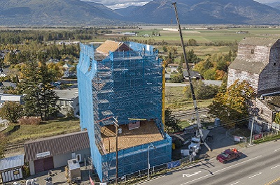 Trust Pauses Work on Grain Elevators; Seeks Other Funders